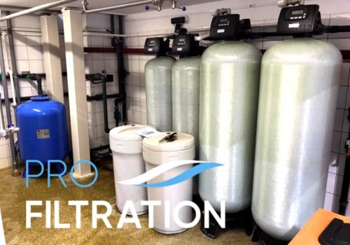 Commercial multi tank water softener system for continuous operation in large facilities