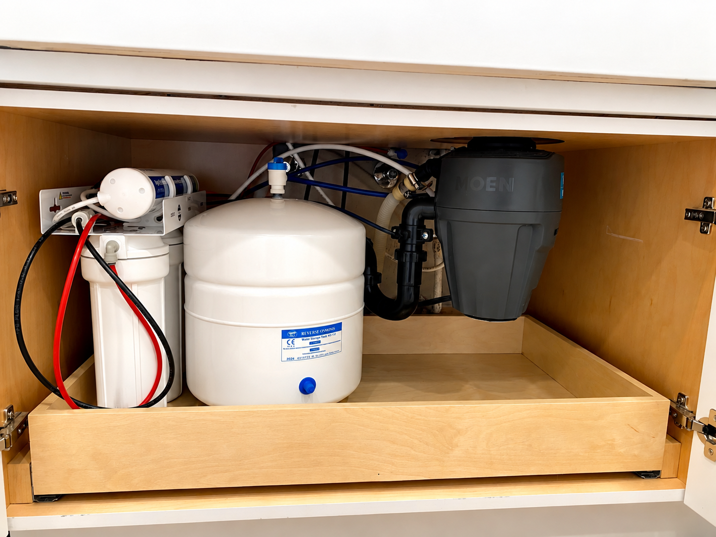 Under-sink reverse osmosis system with storage tank installed in Orange County